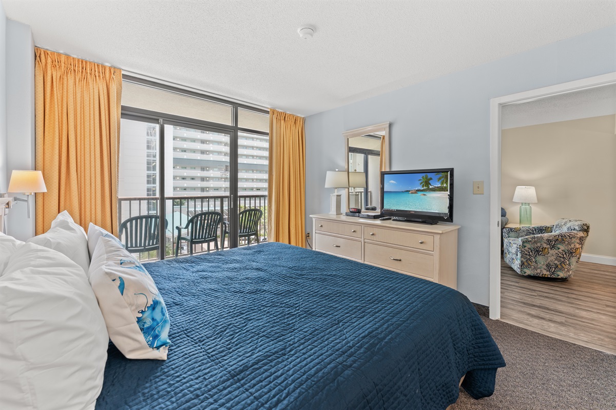 Main Bedroom with king bed, on suite and access to balcony