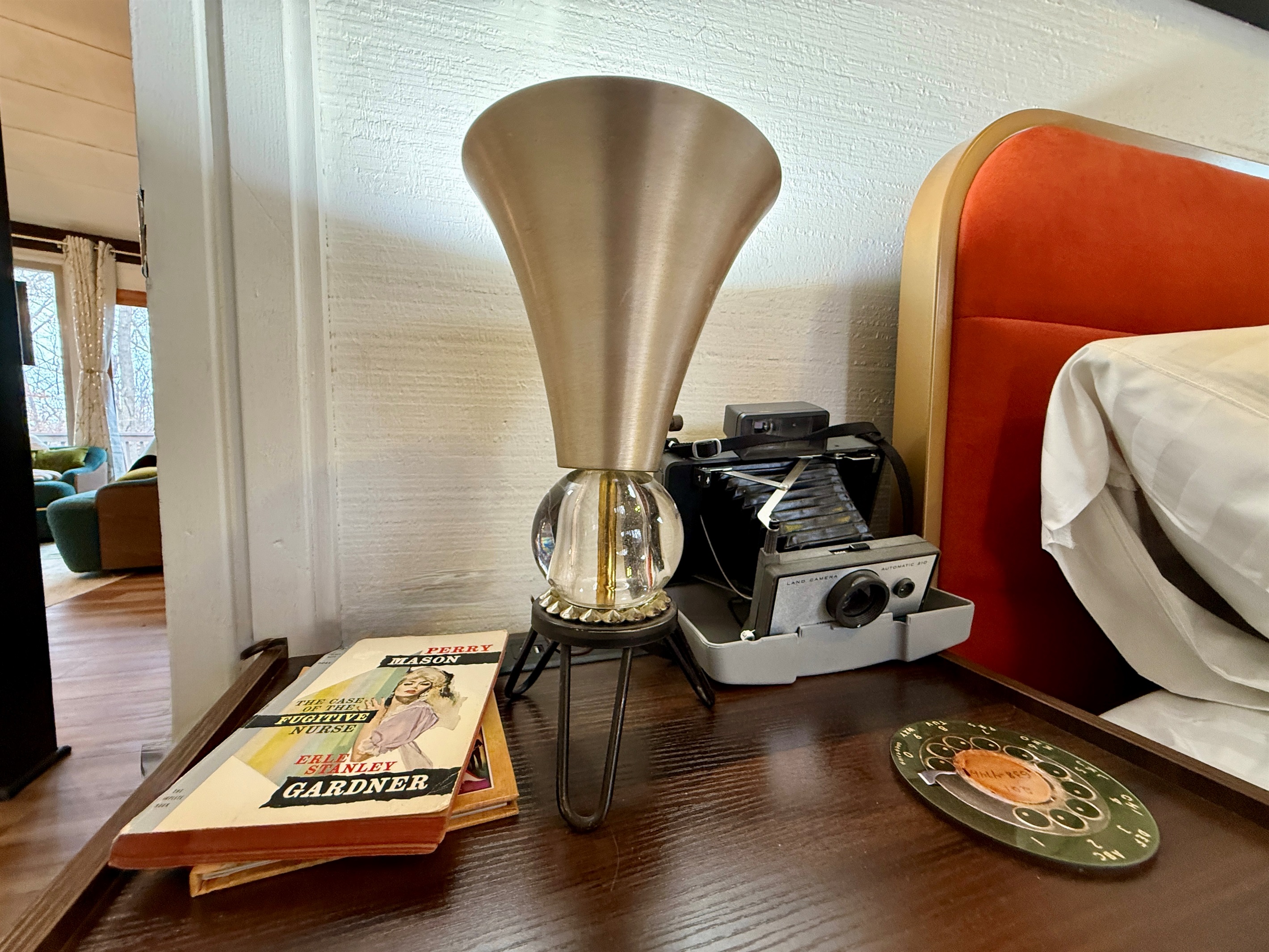 We put TLC into finding 1960s and 70s fun accessories like polaroid camera, lights, and books