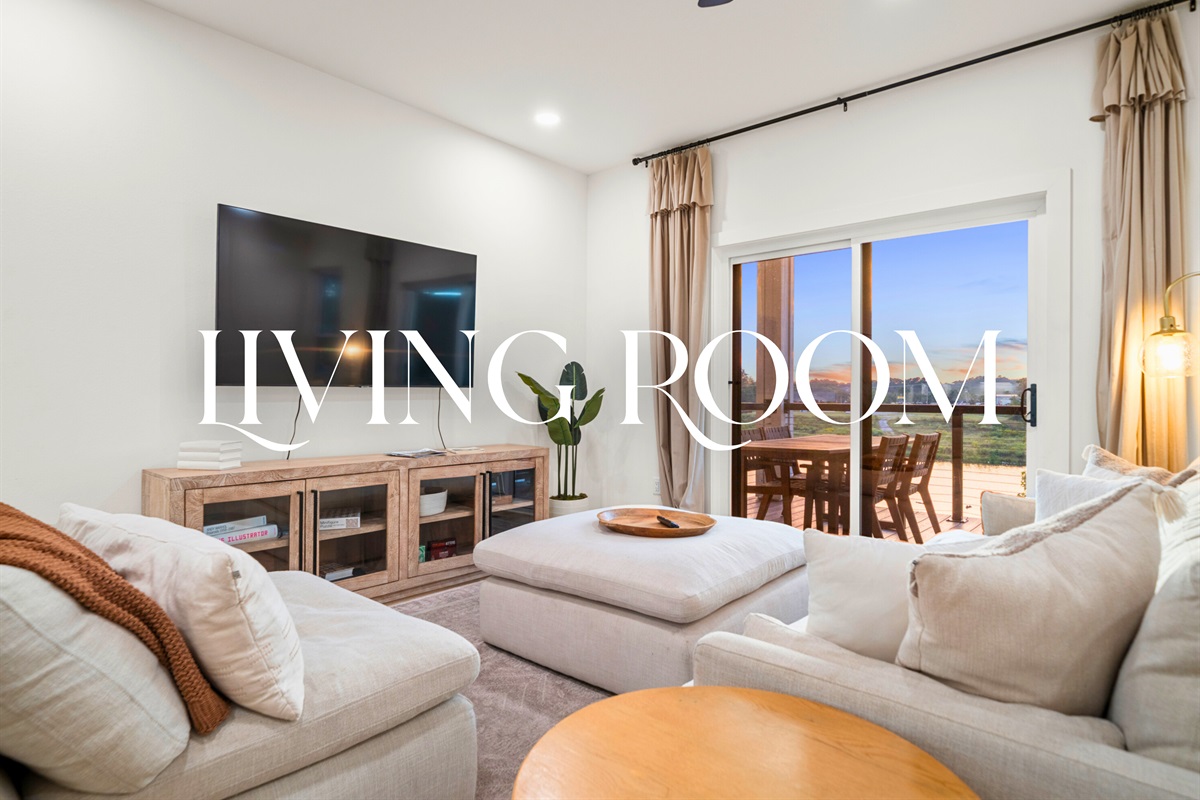 Cozy living room with plush seating and Smart TV for relaxing evenings in.