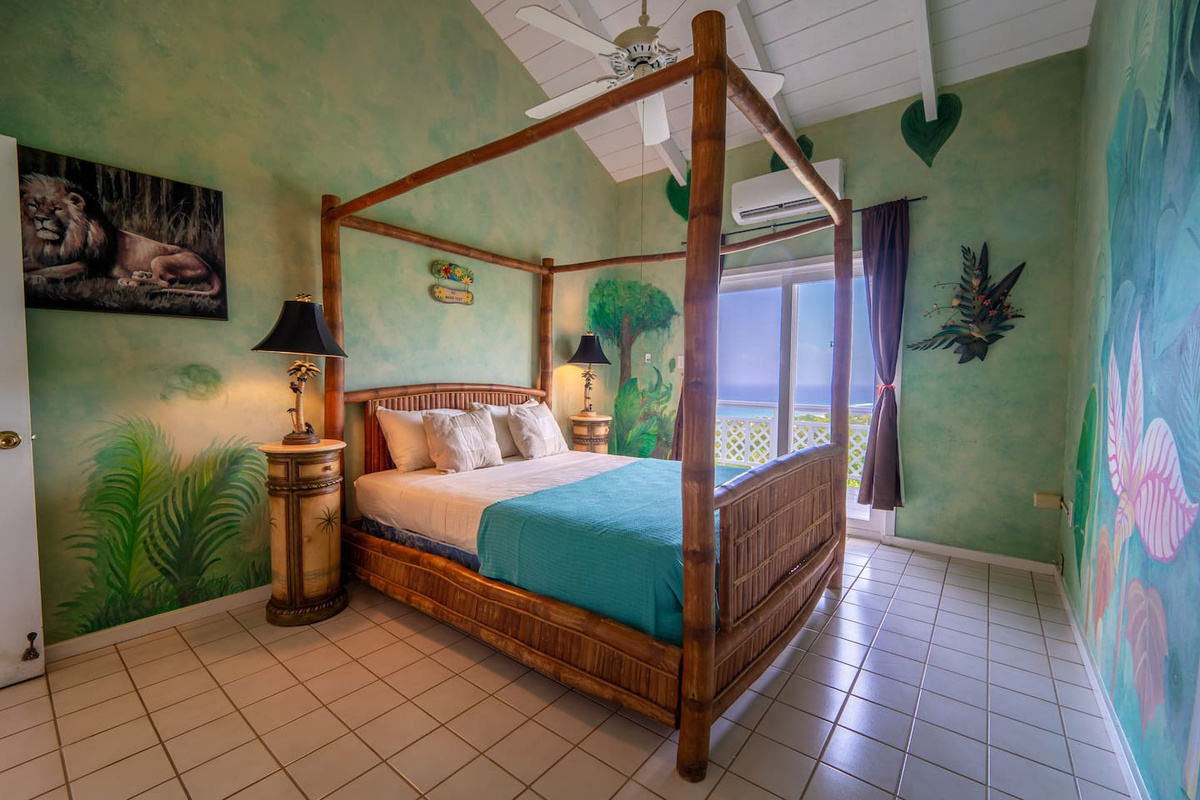 The Jungle Room!! 
Bedroom 4 (Queen) w/ shared balcony - located upstairs