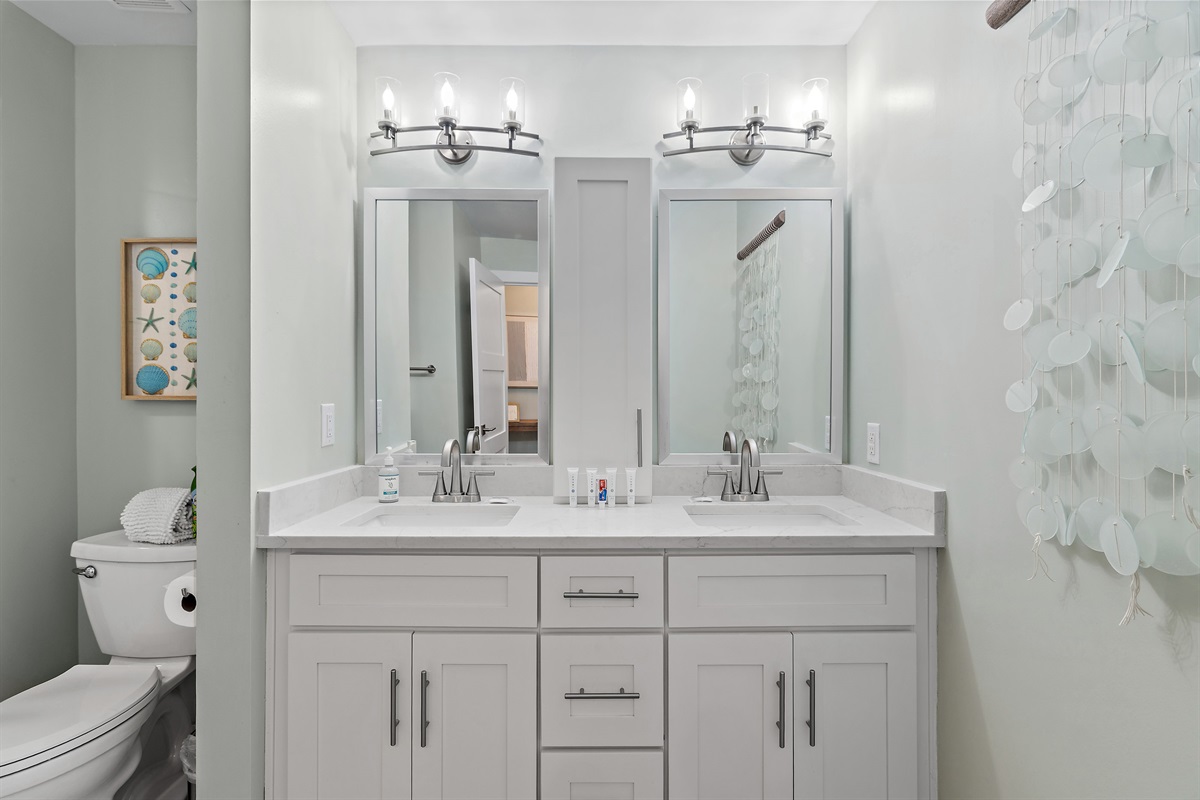Remodeled Bathroom with Dual Vanity and Walk in Shower
