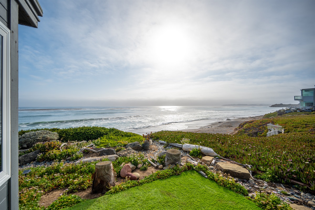 Back patio seating area oceanfront views