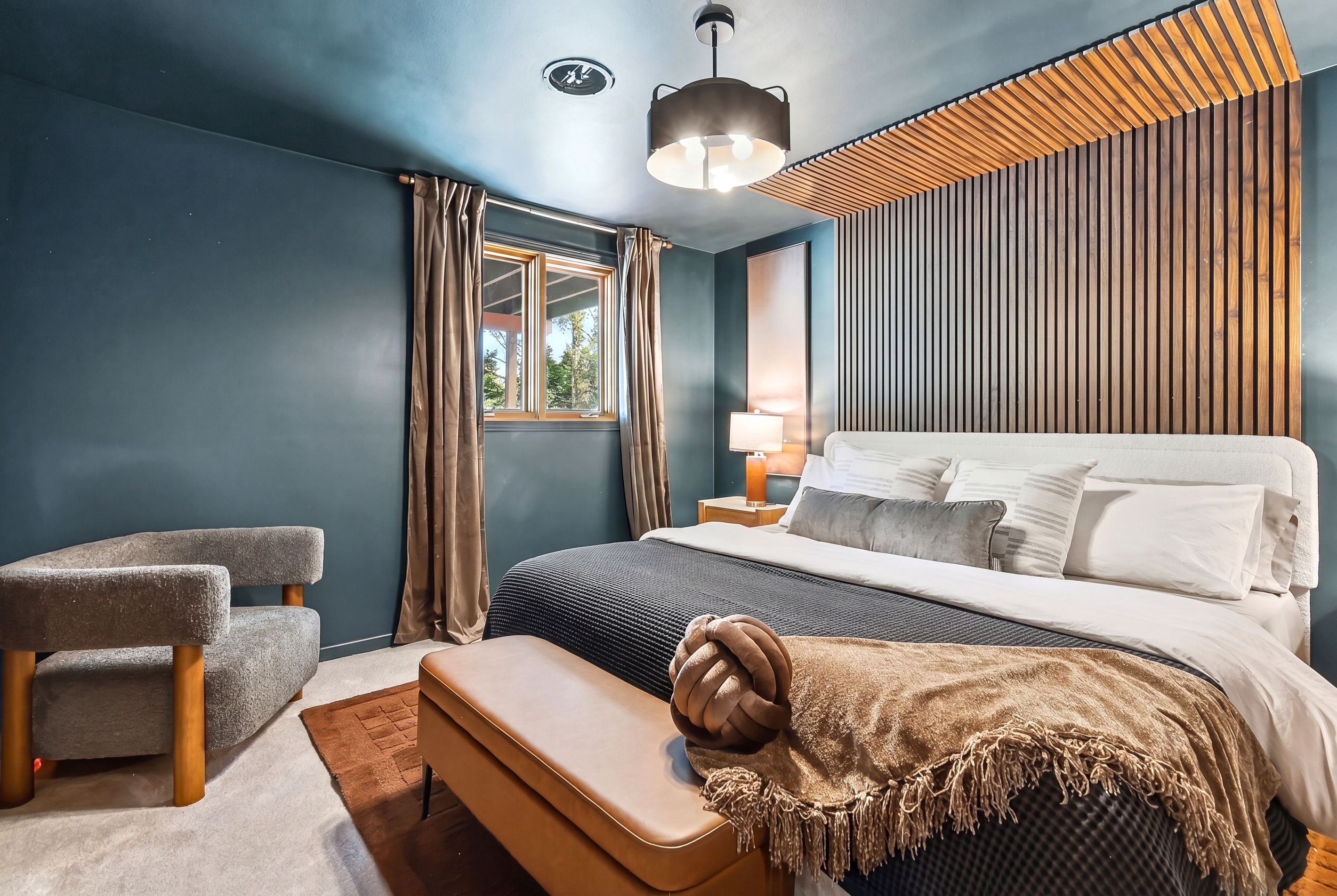 Get away to the private bedroom downstairs...