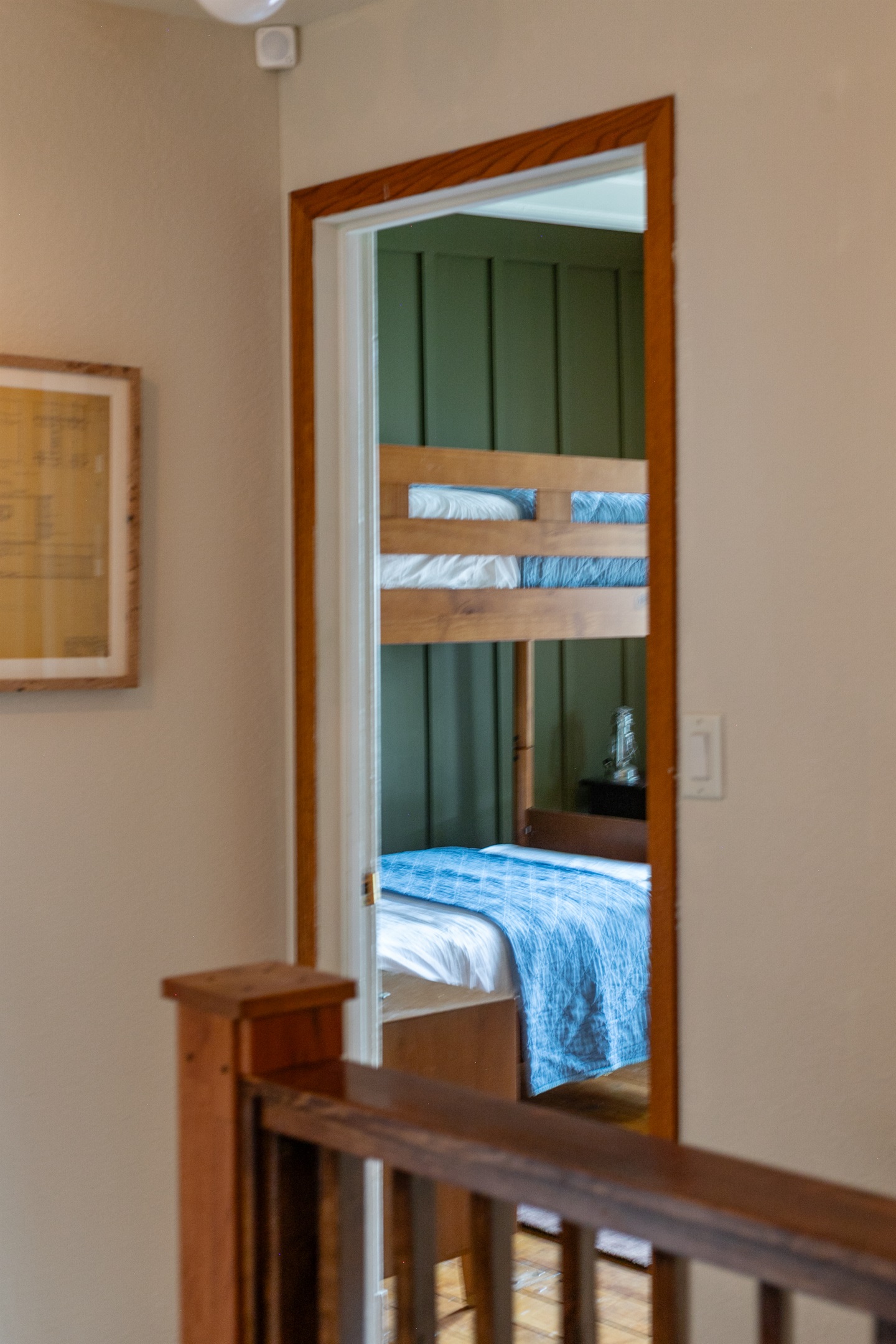 The bunkroom is the first room you’ll find at the top of the stairs, making it an easy and welcoming spot for kids or extra guests.