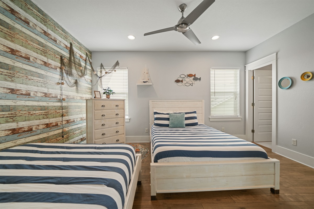 Double Queen Suite offering a bright layout and comfortable sleeping accommodations.