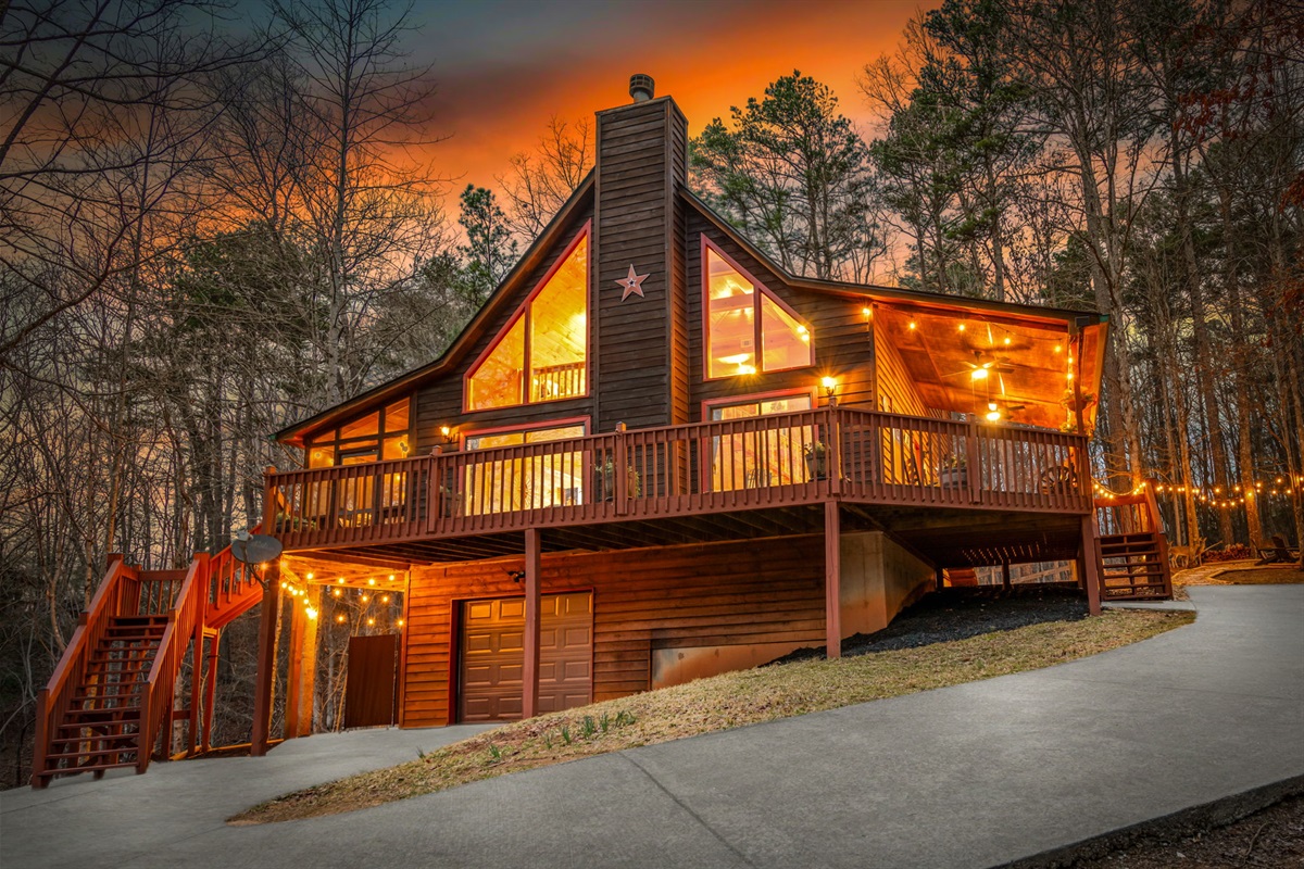 Exterior of the home comes to life as the lights turn on, creating a warm and inviting glow.