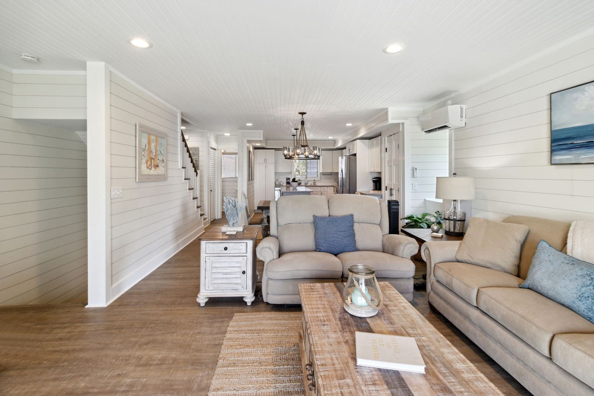 From the kitchen side &mdash; the whole main floor opens up for easy flow between cooking, dining, and relaxing.