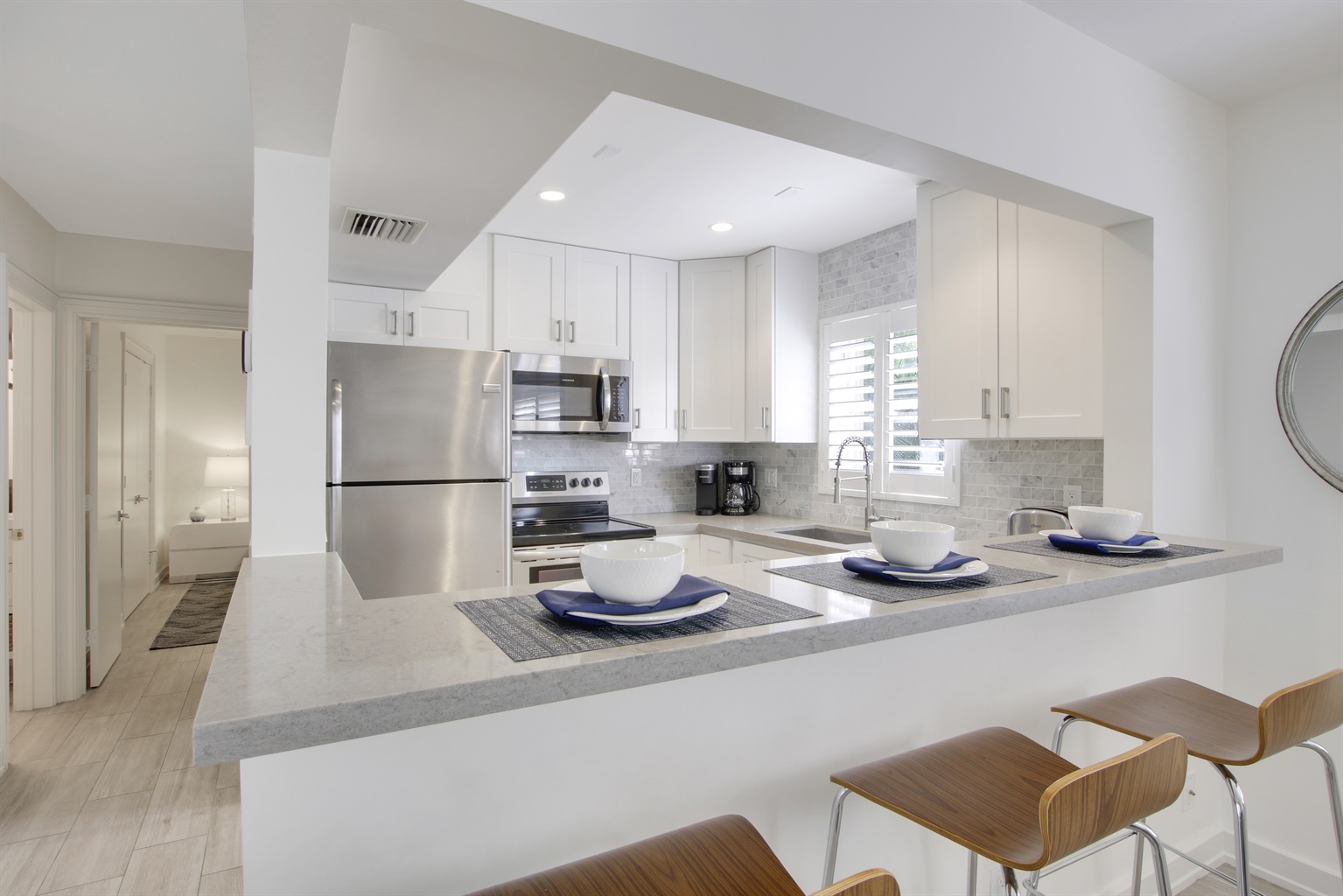 Enjoy the open concept kitchen, grab a bite at the island bar