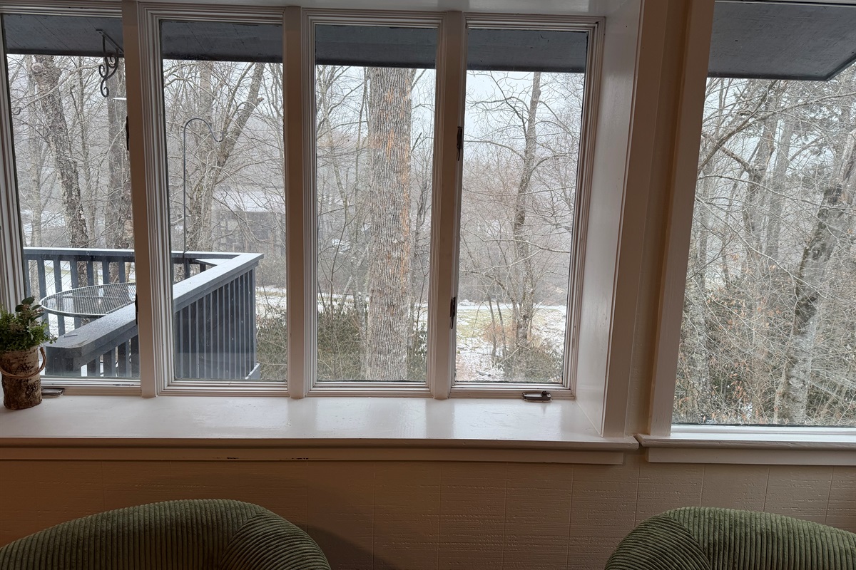 Back view overlooking Sugar Golf Hole 4 fairway and green with the sounds of stream. 