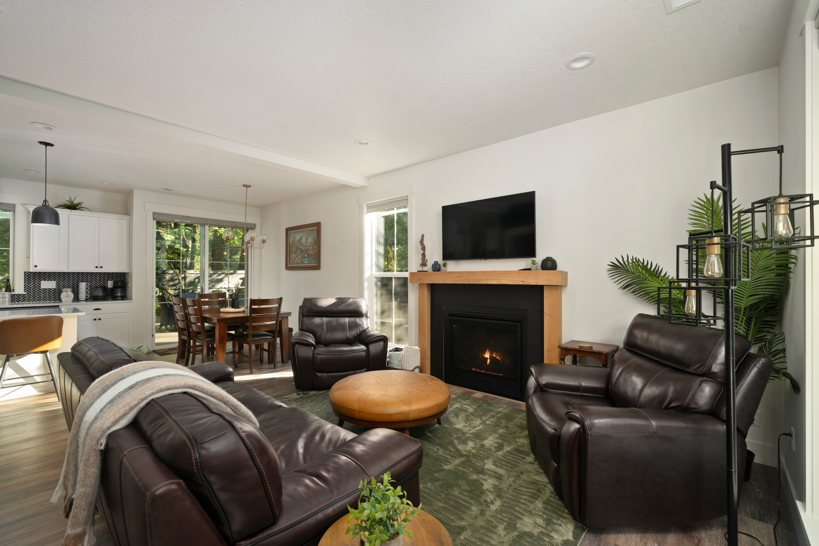 Curl up fireside in a cozy living room built for rainy PNW nights.
