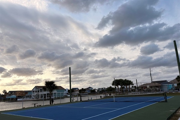 Tennis and pickleball courts available for your use just a walk or golf cart ride away.