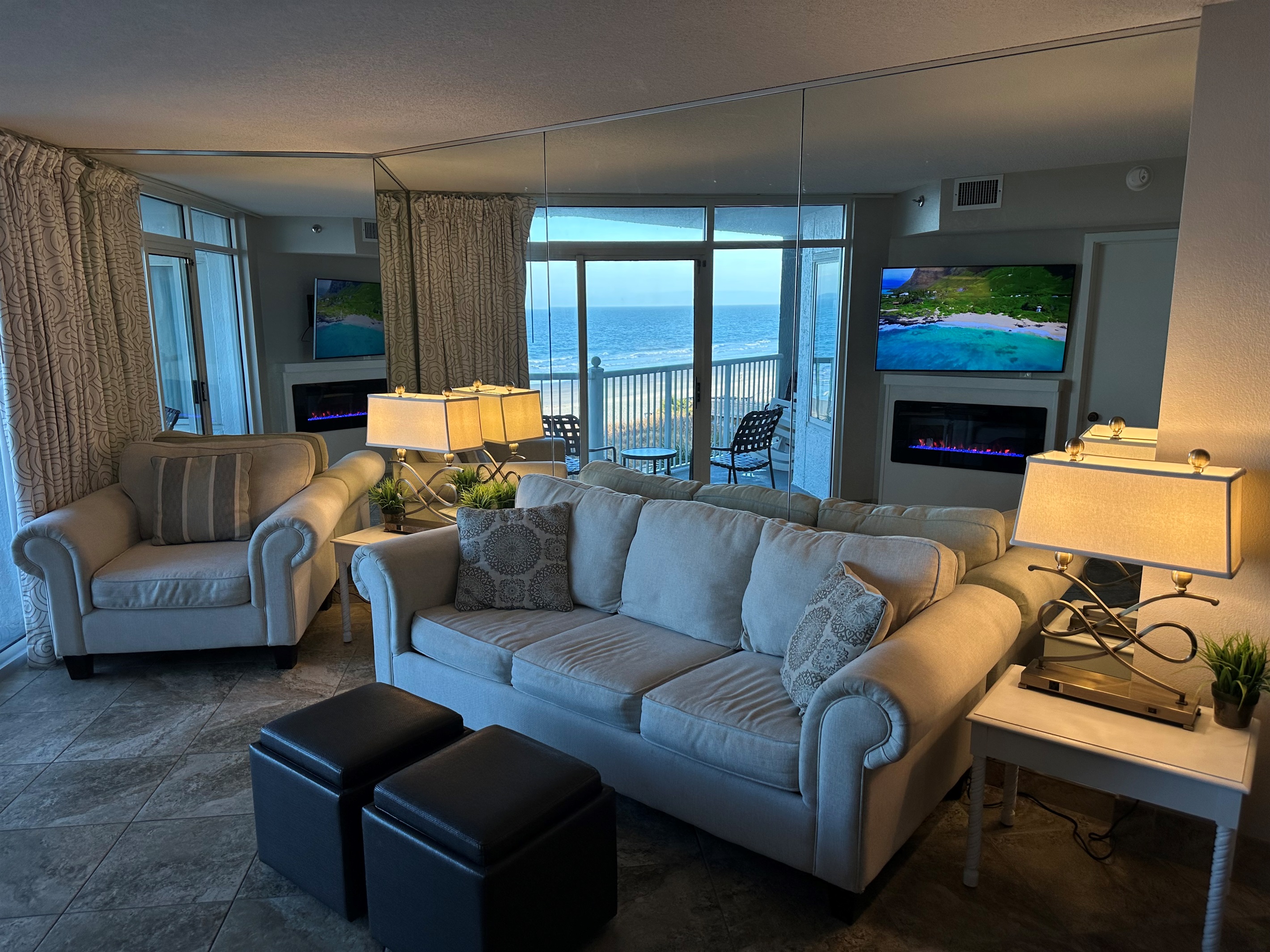 The mirror behind the couch - a clever design detail that doubles the ocean view