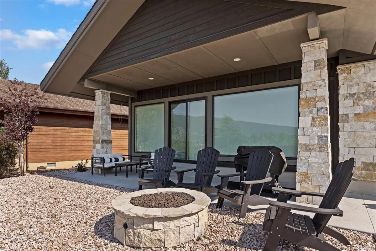 Gather around the outdoor fire pit and enjoy crisp evenings under the open sky.