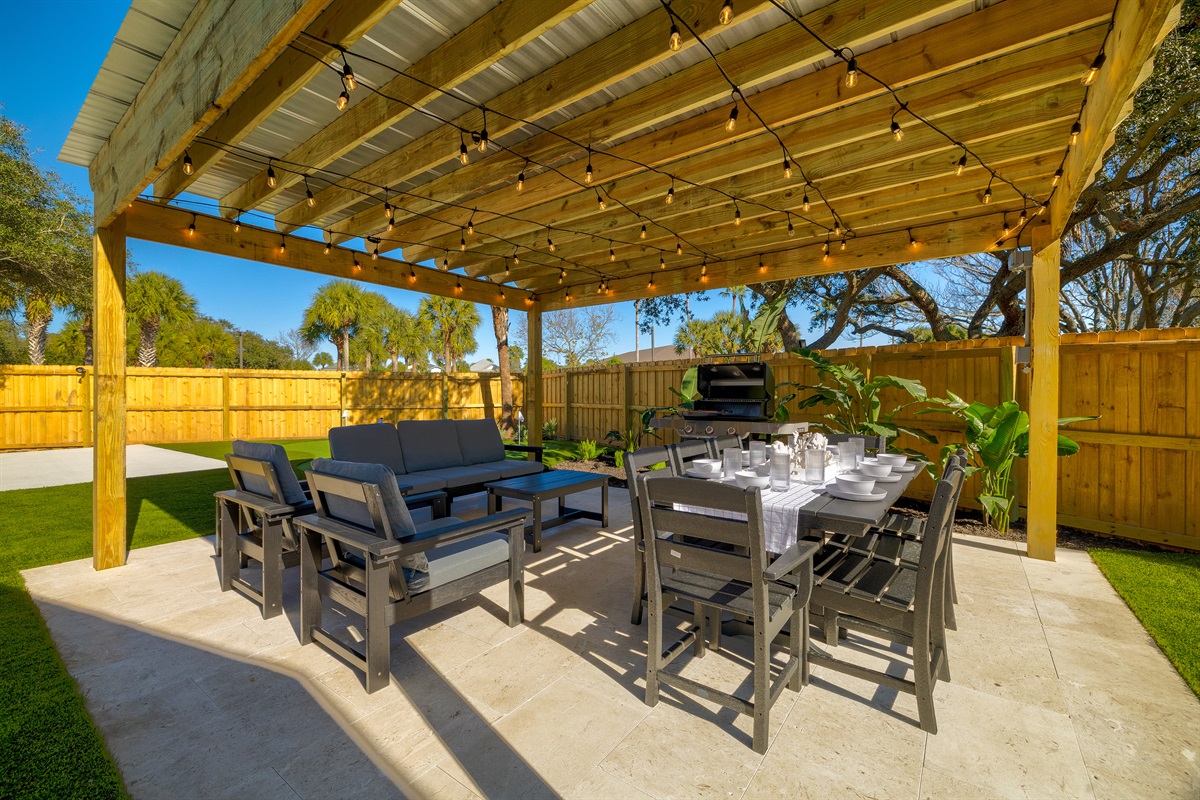 Where memories are made 🌴
String lights, cozy seating, and open-air dining create the ultimate backyard entertaining experience.