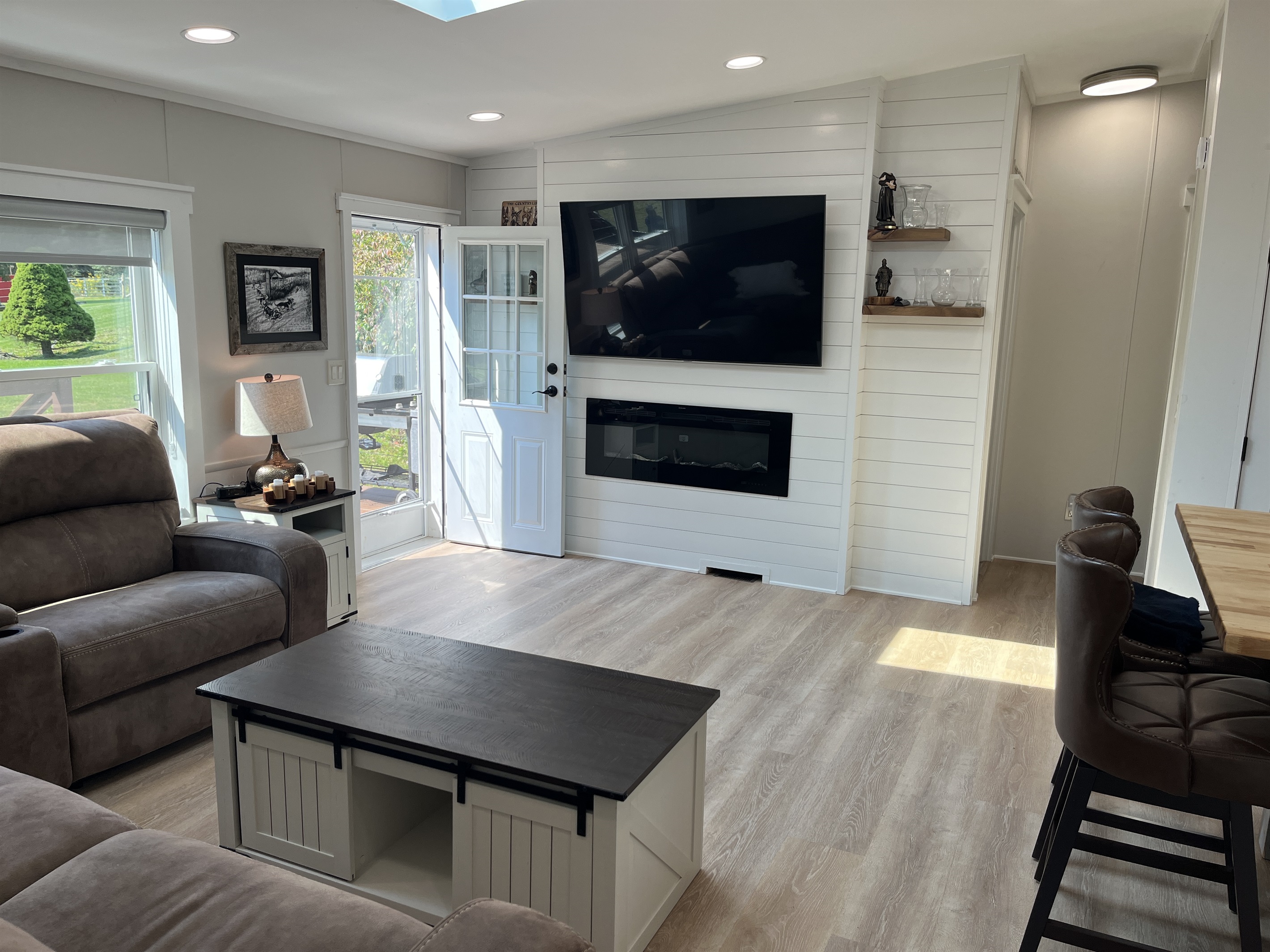 Living area with sectional and SmartTV