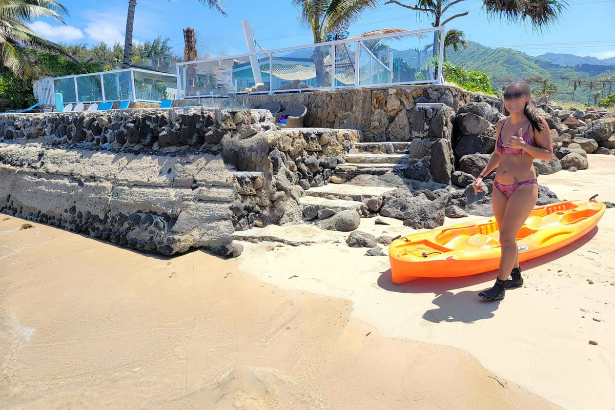 Private steps from the home's private beach leading to a cove and crystal clear waist-deep snorkeling coral reef for kayaking, fishing, snorkeling and swimming