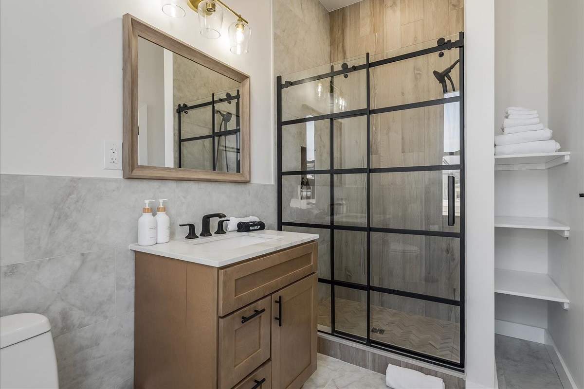 Refresh and unwind in this beautifully designed bathroom with a shower.