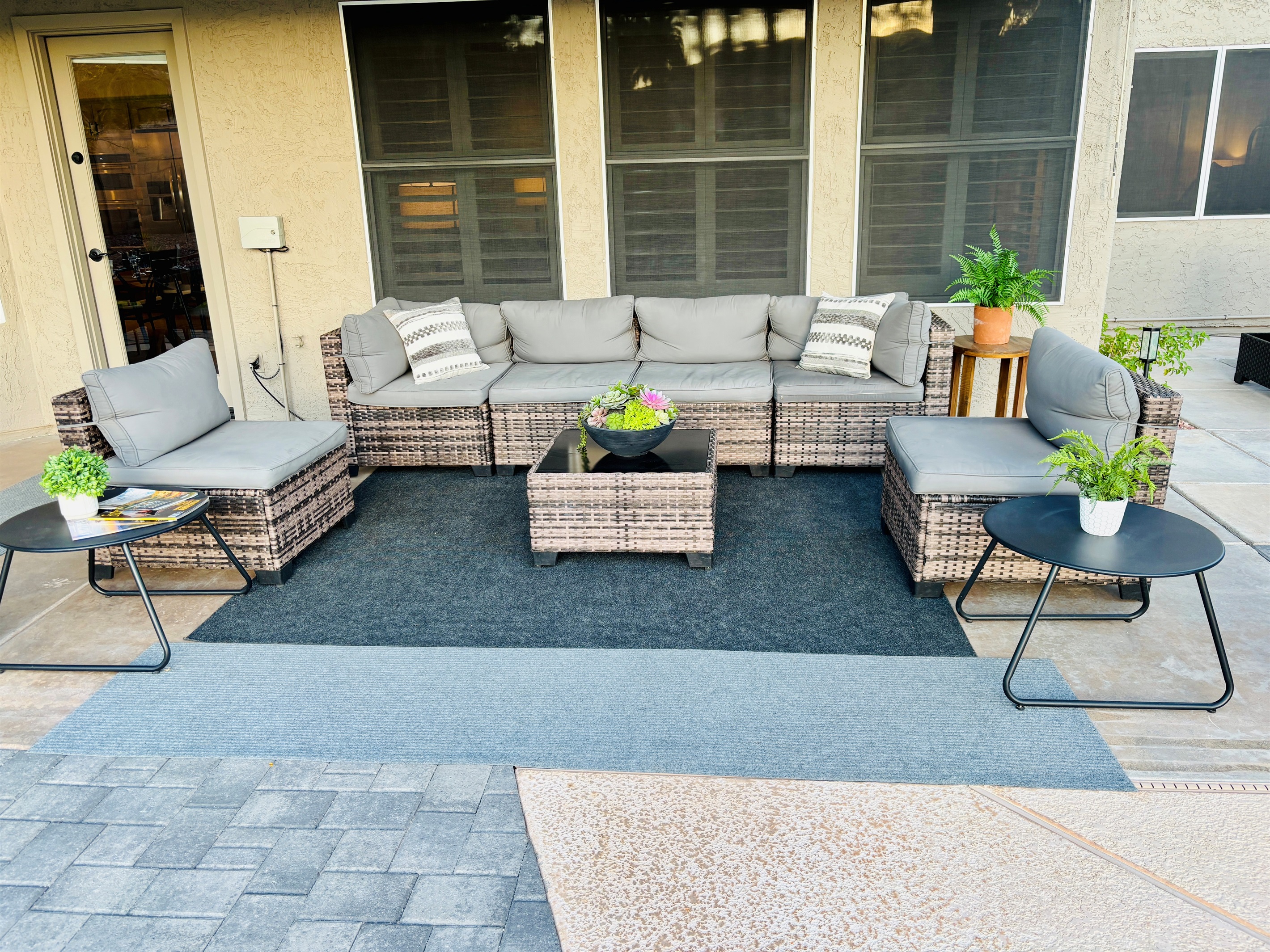 One of several patio seating areas in backyard