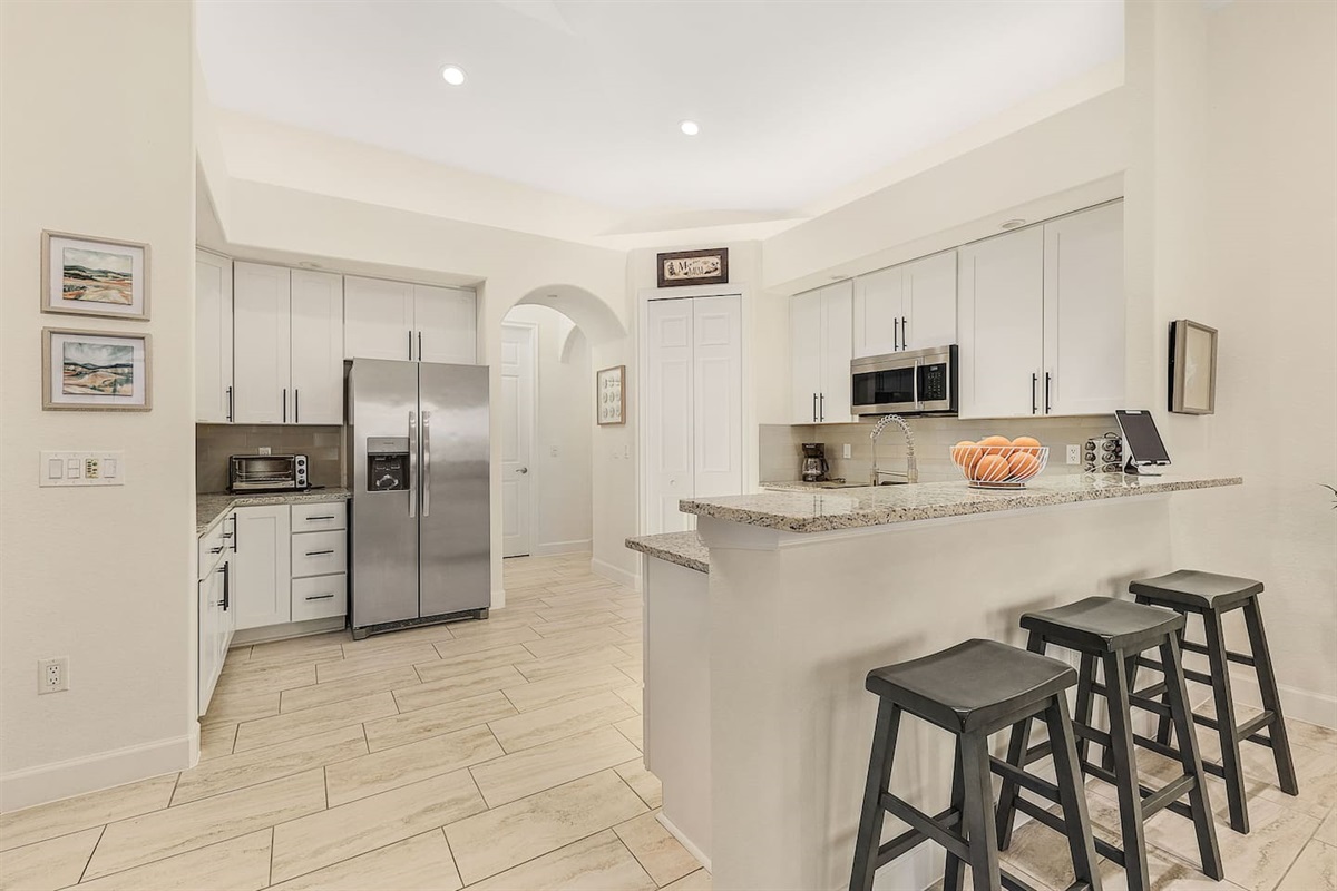 Indulge in a culinary adventure in the spacious kitchen!