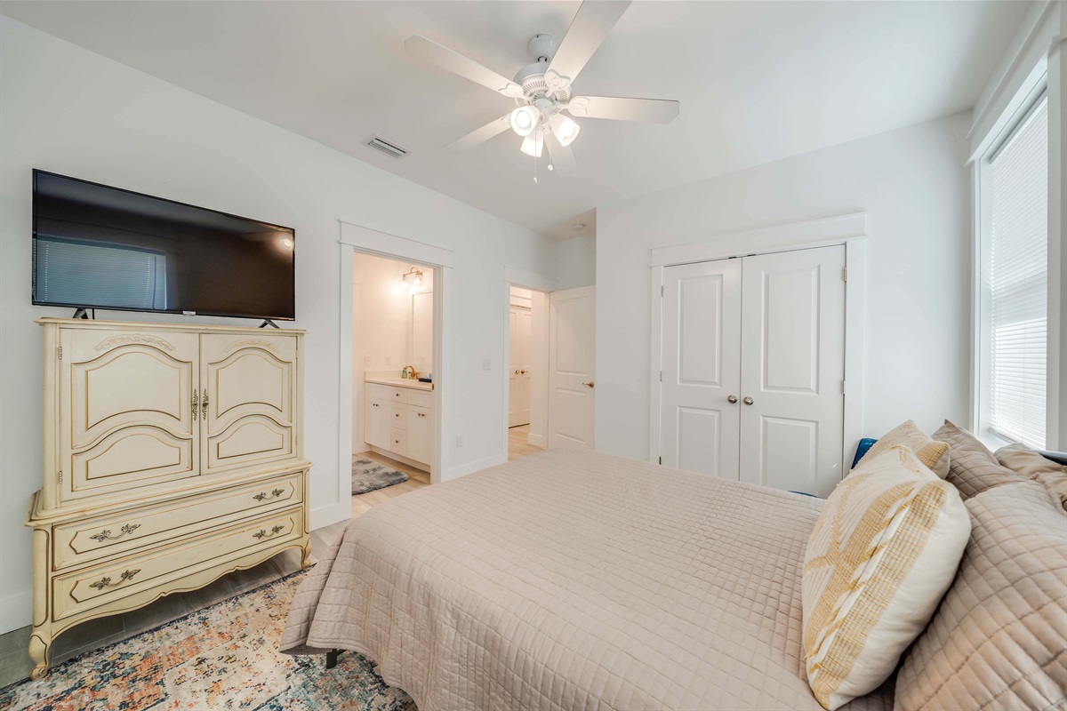 Wake up refreshed on a supportive mattress in this bright space. The cool tile floors feel great on warm afternoons.
