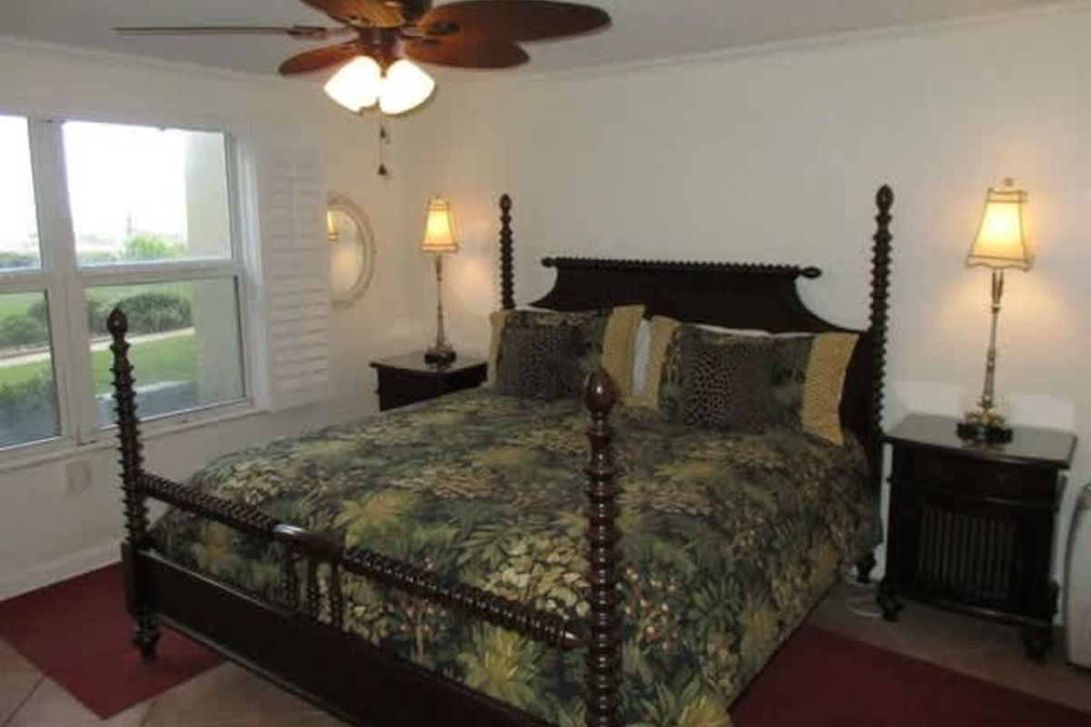 King Size bed with partial ocean views 