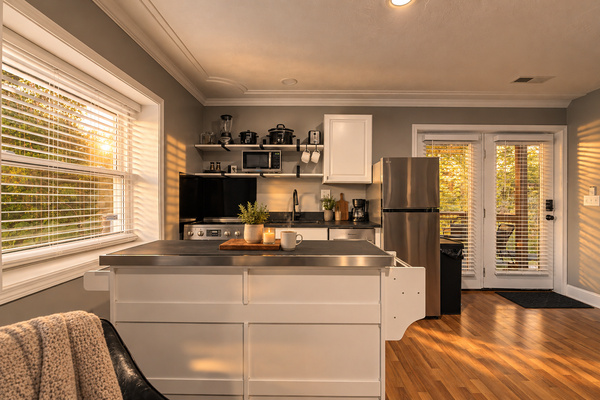 Full kitchen with large island, full-size appliances and everything you need to cook for a group of 10.