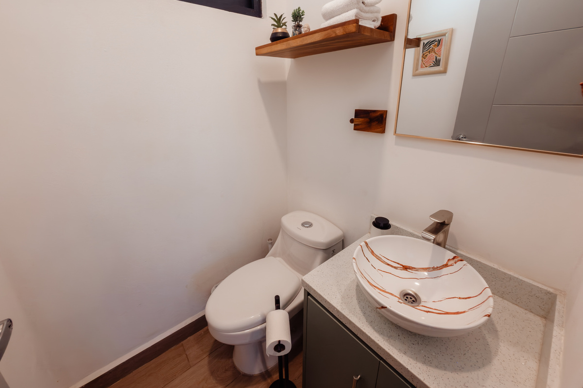 Mirror-image powder room off the main floor.