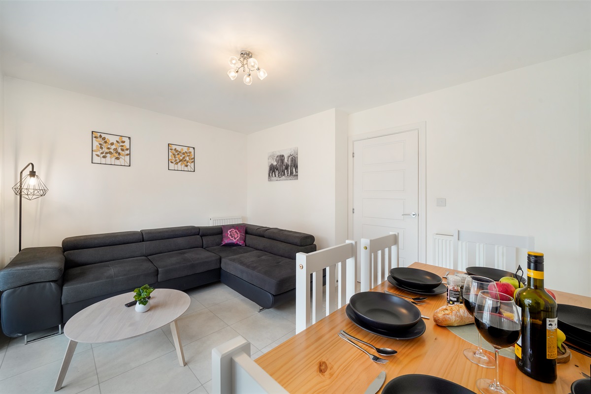 [Dining x6 , large L shaped sofa, garden facing]