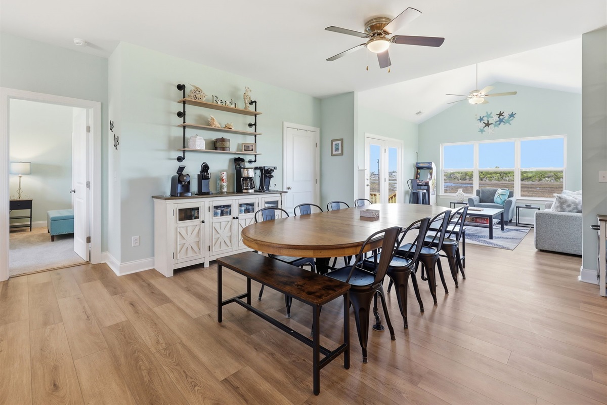 Coffee bar setup next to a spacious dining area with views throughout