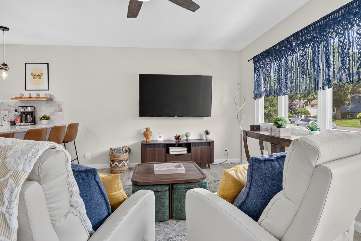 Swivel seating lets you enjoy the conversation, the kitchen, or the Smart TV.