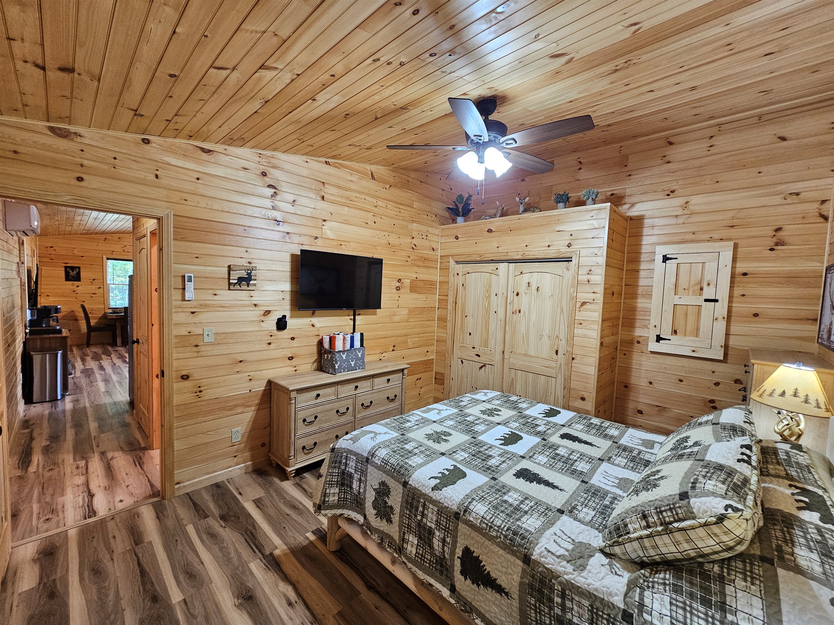 Cuddle up in bed with a movie or wake up slow with the forest view just outside your window