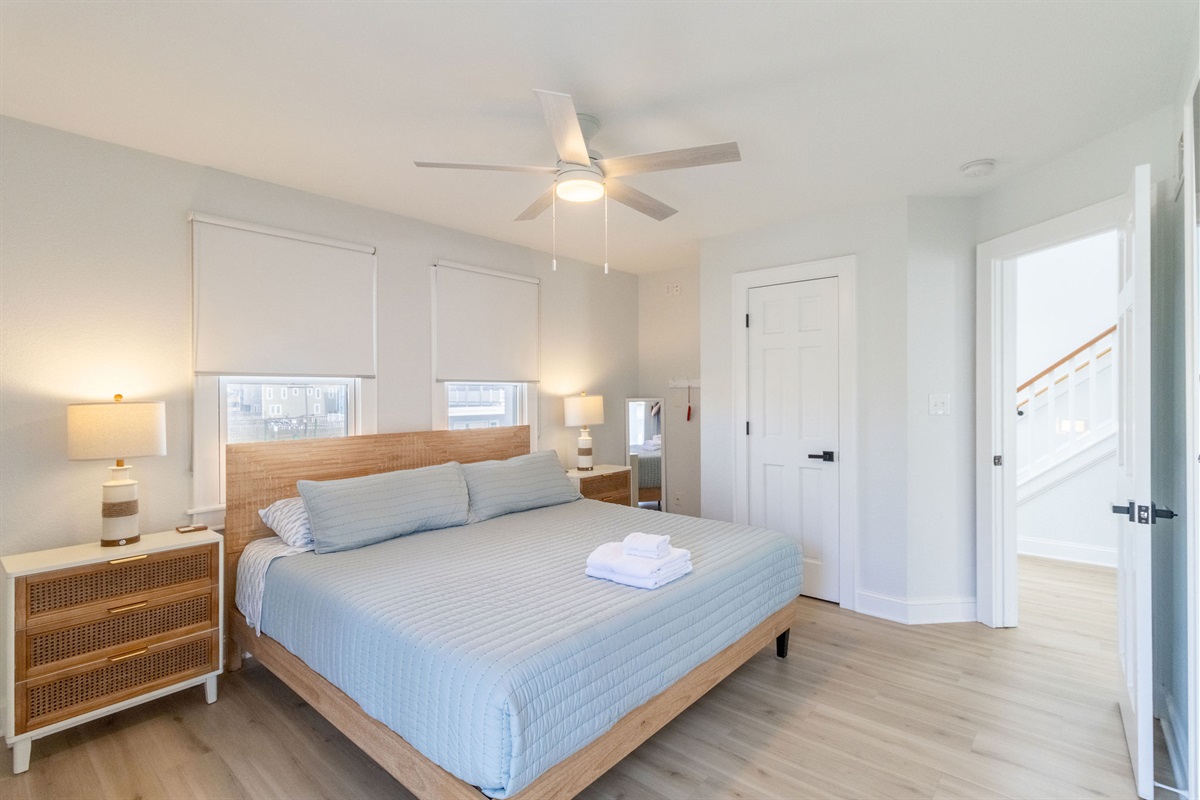 Get an awesome nights sleep in this king master bedroom with 50" ROKU TV!