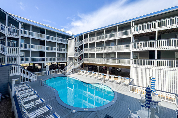 Courtyard pool tucked between the building wings