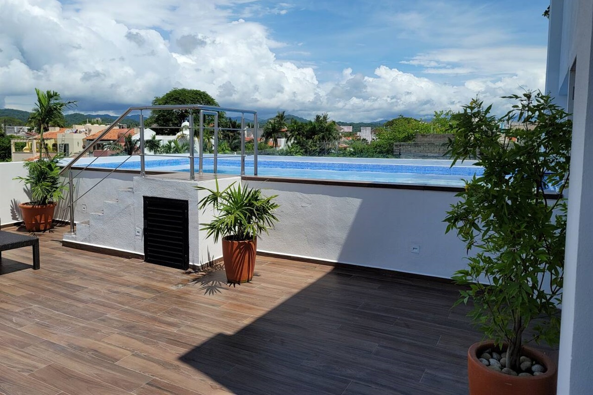 Roof Top pool 25 feet from your front door.