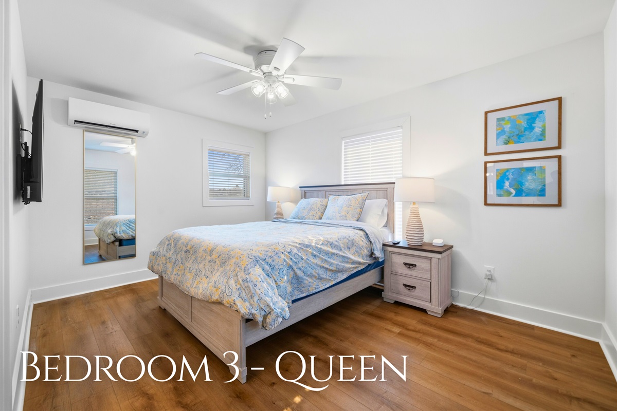 Soft colors and comfortable bedding make this queen bedroom a cozy and inviting place to settle in for the night.