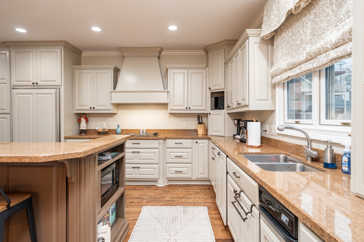 [Kitchen] The Bright and Spacious Kitchen is Filled with Everything you'd Need to Whip Up a Family Favorite.