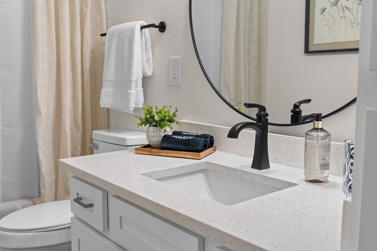 The second full bathroom is conveniently located near the guest bedroom and living areas.