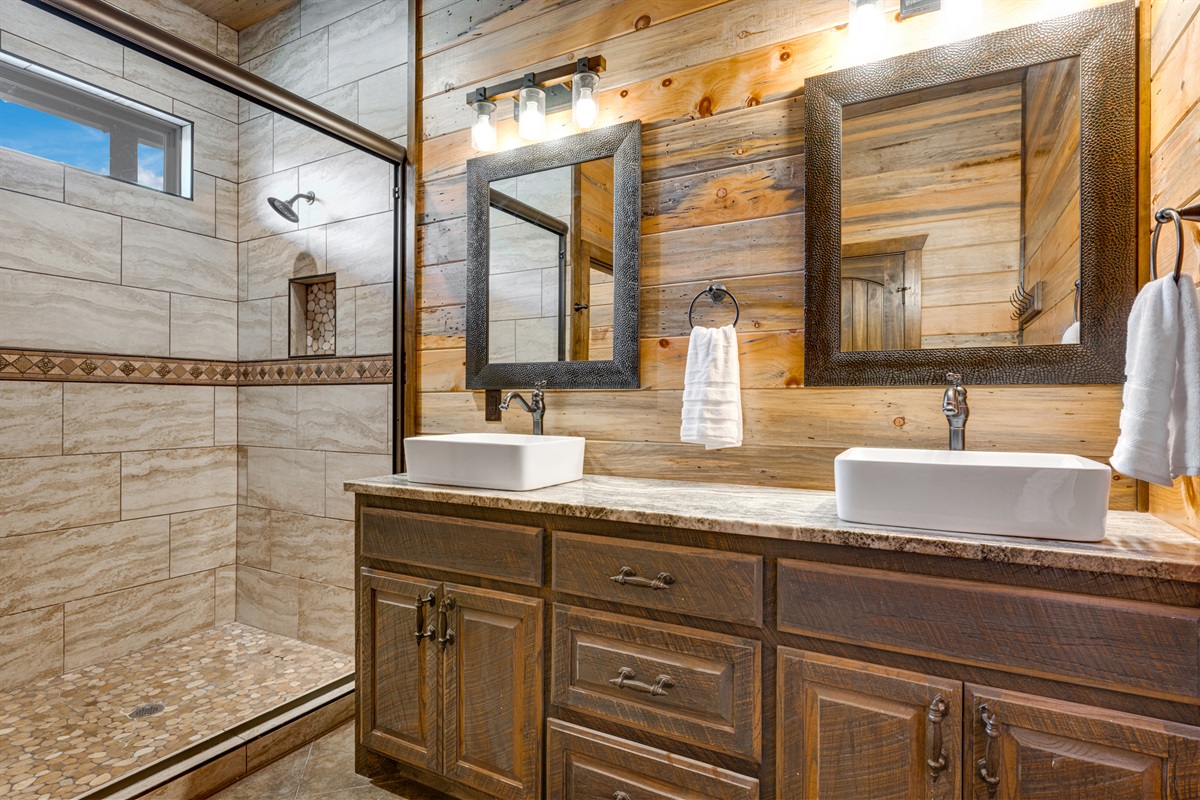 Main Bathroom: Relax in luxury with modern fixtures and rustic charm—your oasis awaits!