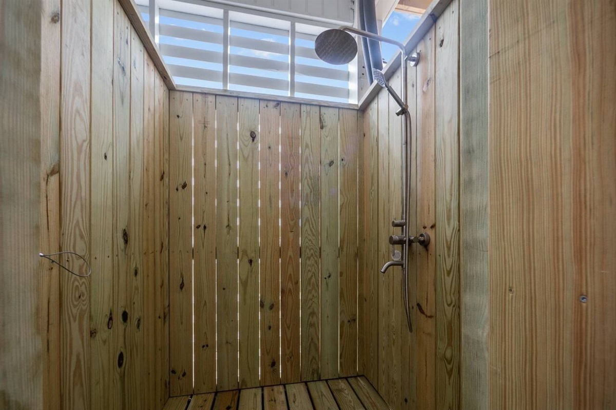 Outdoor Shower in parking area with hot/cold water