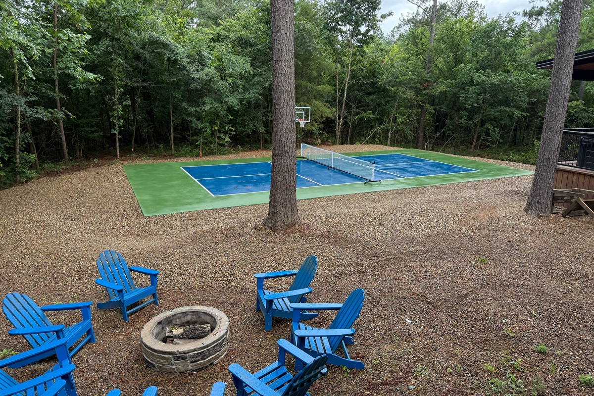 Brand-new private sport court — shoot hoops or enjoy a game of pickleball surrounded by nature!