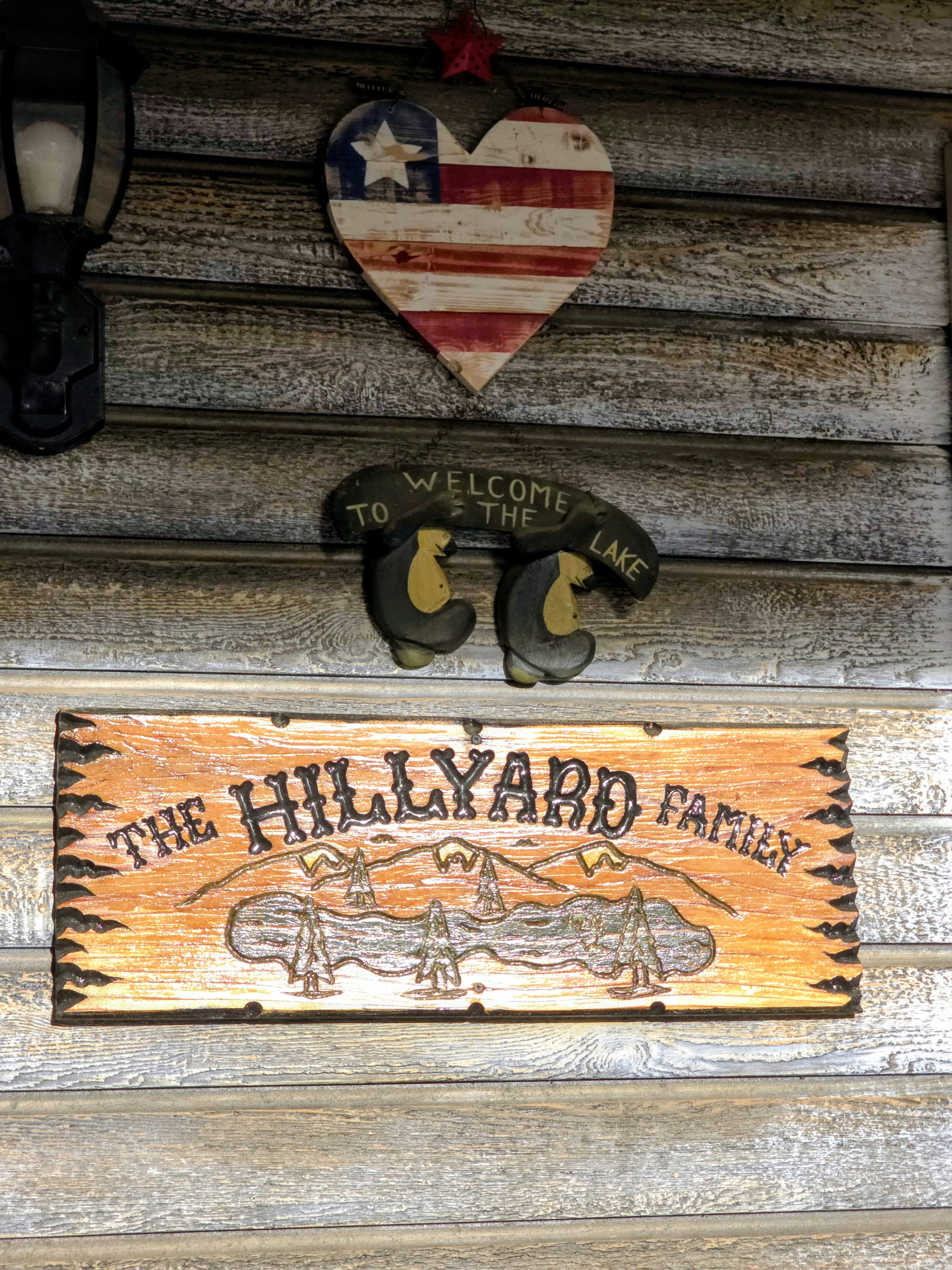 Family sign next to the door entering the kitchen