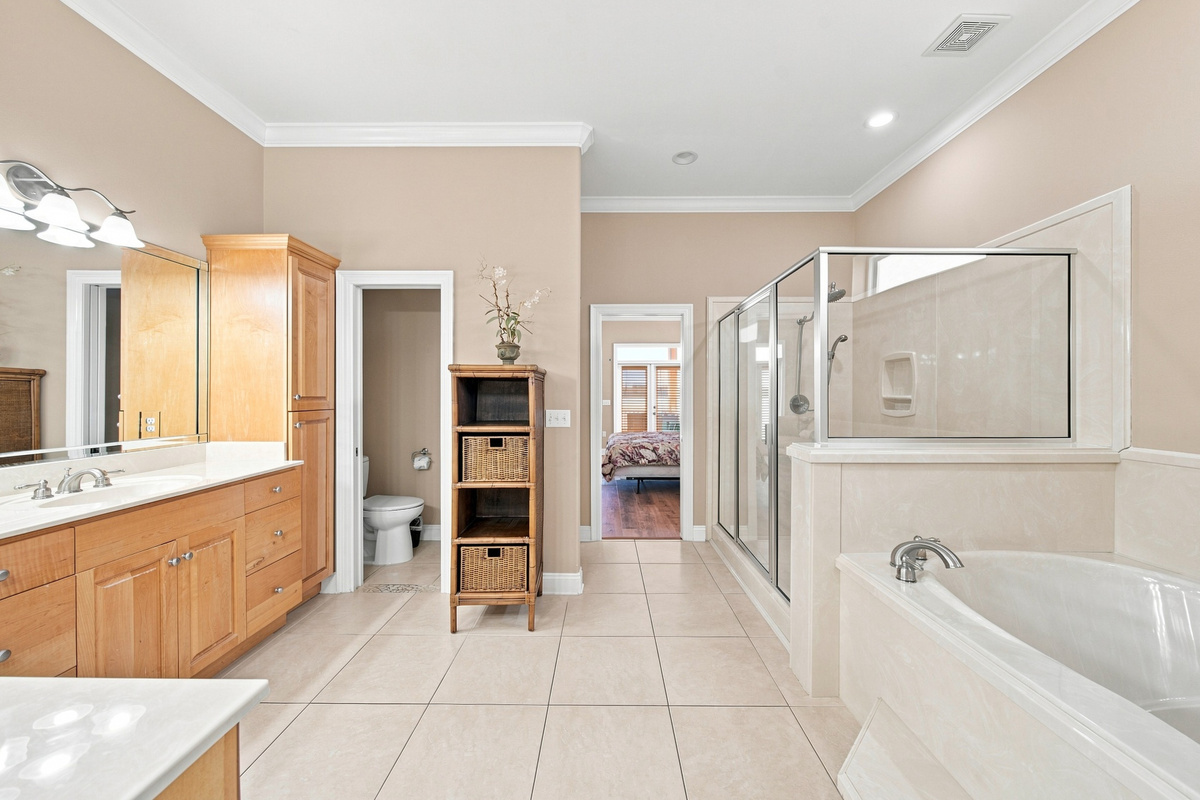 Bathroom with a vanity and soaking tub