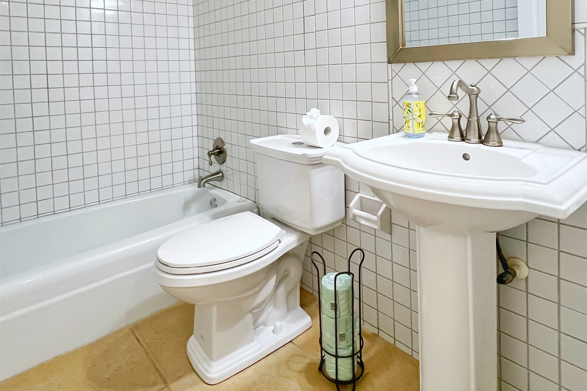 Step into a well-lit bathroom with all the essentials for a stress-free vacation.