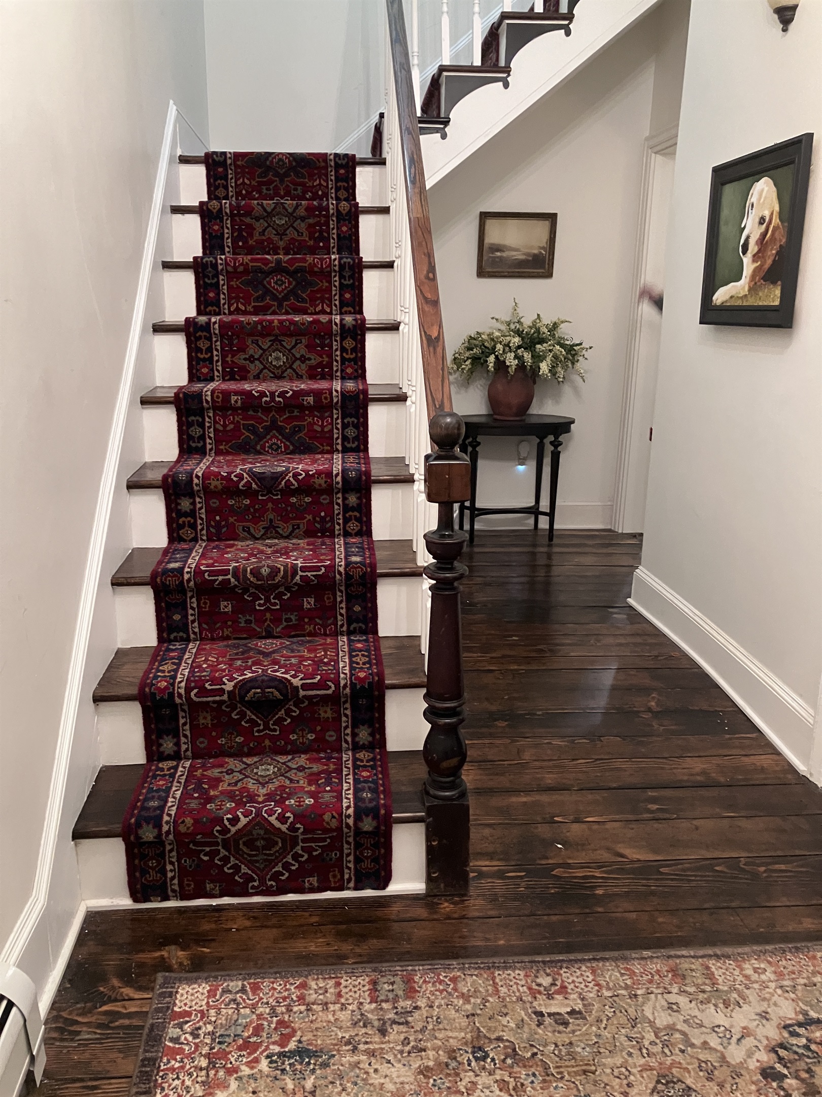 Vintage stairwell and hallway entry welcome you to Woods Hollow