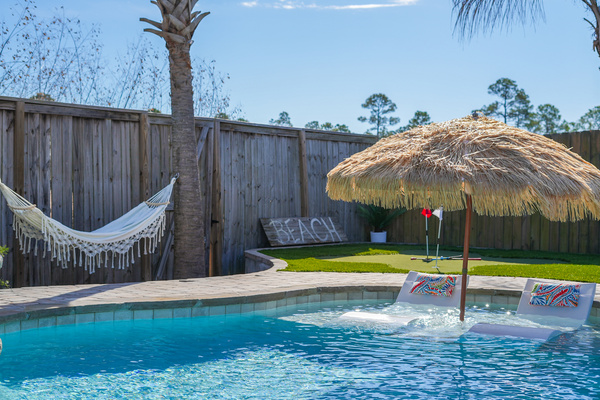 Resort-style private pool and spa for relaxing after a day at Panama City Beach.