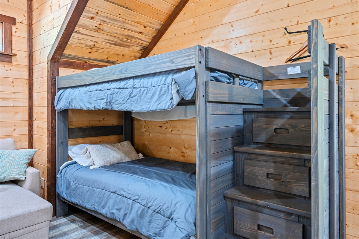 Bedroom with built-in bunks perfect for family stays.
