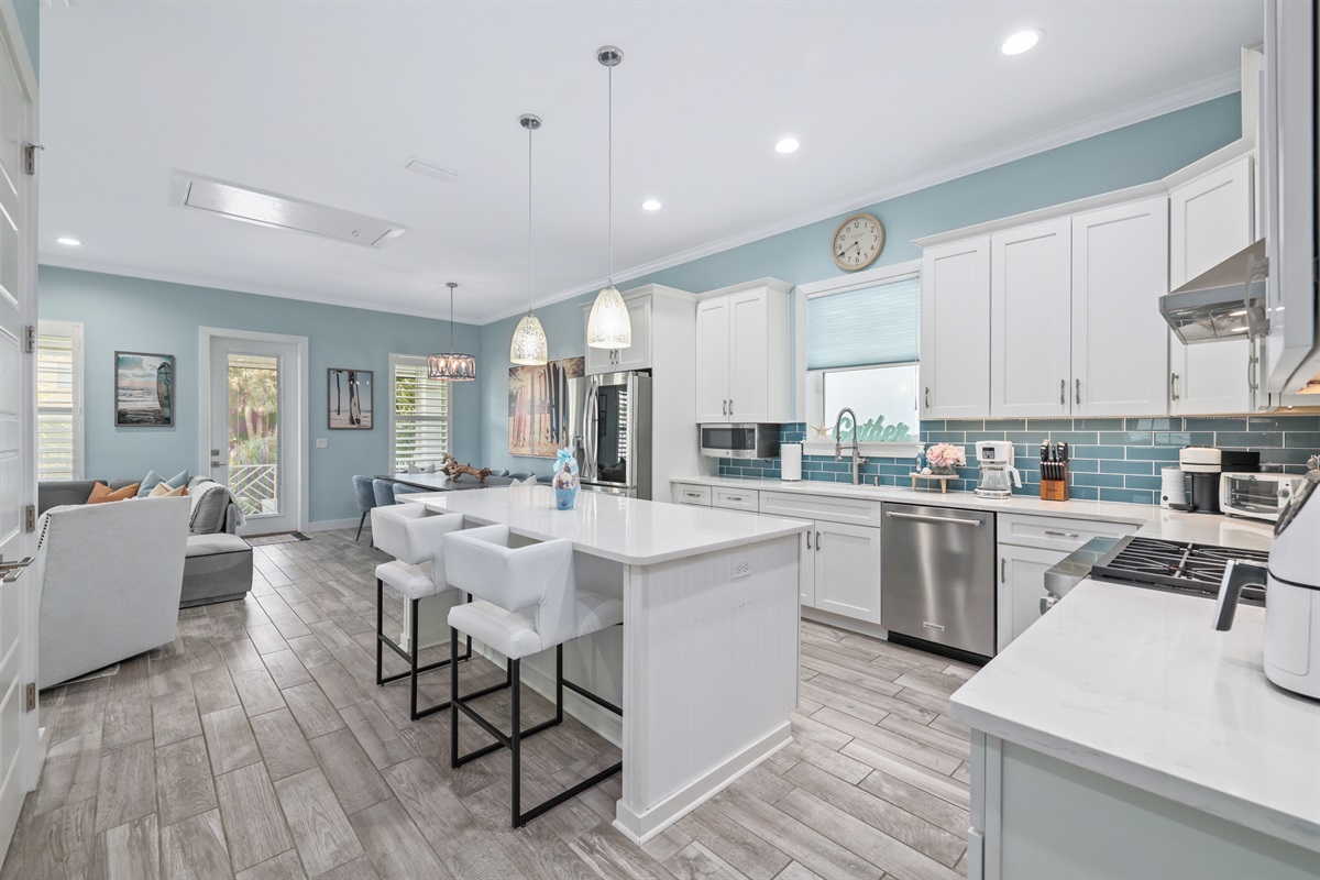 Open kitchen, dining, and living area