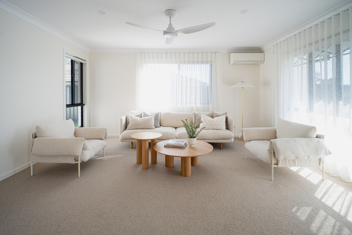 This lounge area adds extra sitting space, with a long sofa, armchairs and a quiet corner for slower moments.