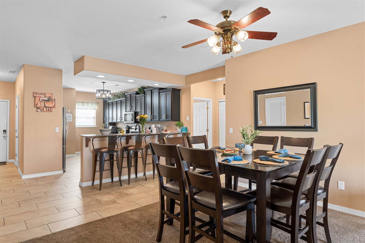 The kitchen has an eat-in bar area next to the dining area so everyone can eat a meal together