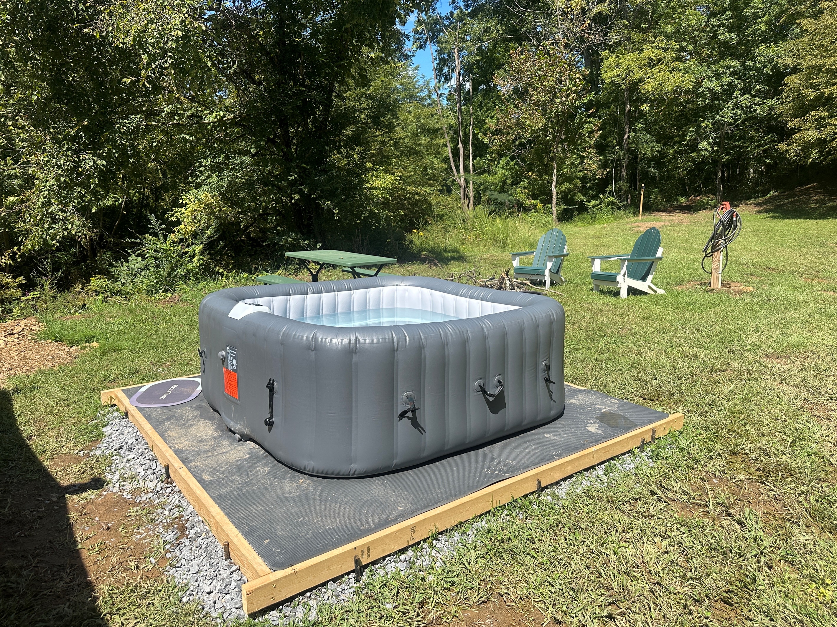 Your private oasis awaits! Relax in the inviting hot tub while enjoying the sounds of nature and the fresh air.